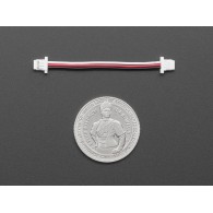 Adafruit 6405 - porównanie rozmiaru do monety